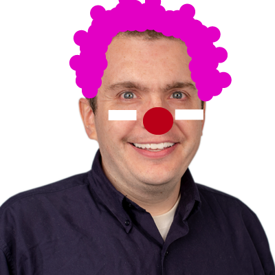 headshot of Patrick Garvin dressed as a clown